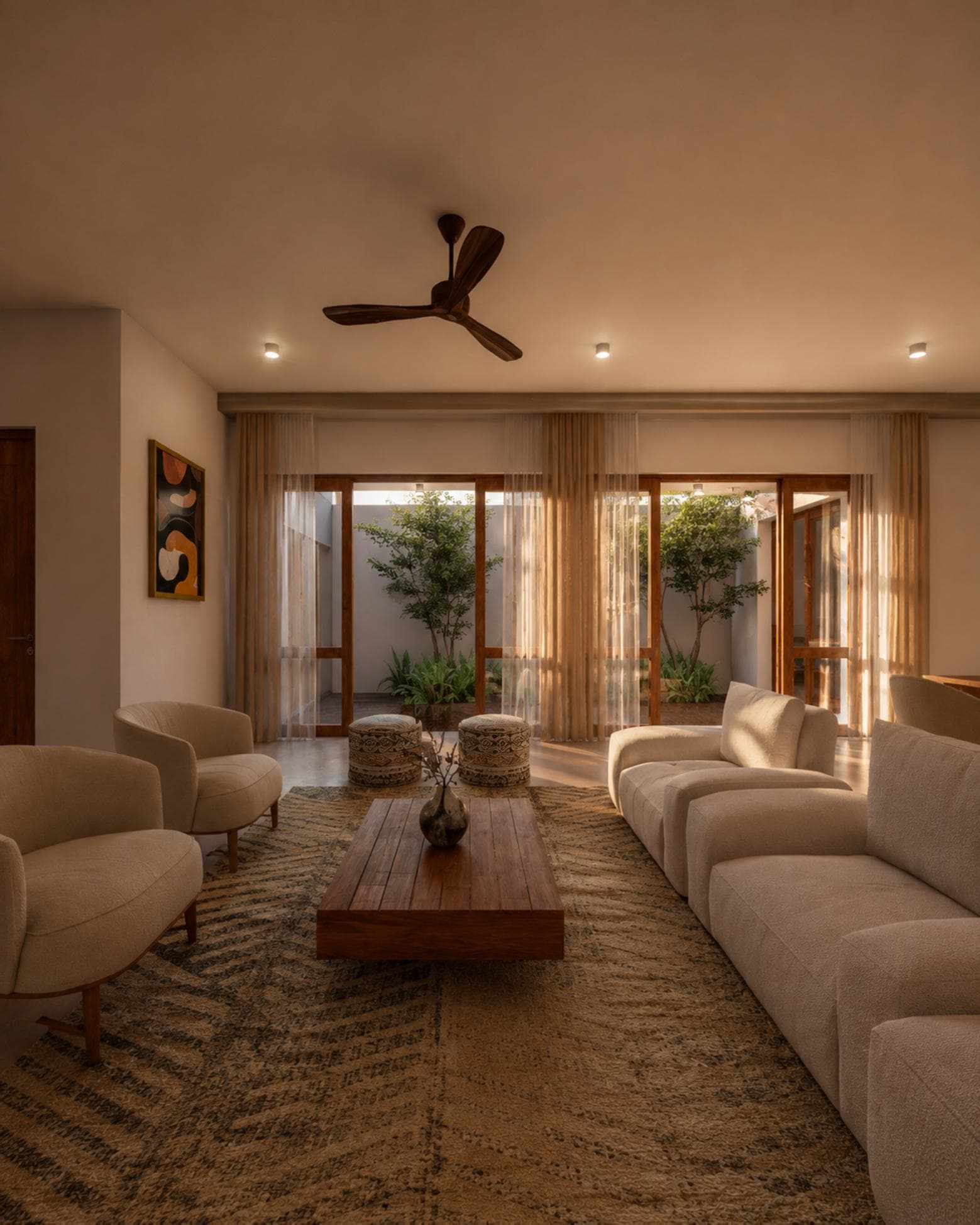 No. 10/10A, Upul Place, Sirimal Uyana — living room opening to a planted inner courtyard through sheer curtains