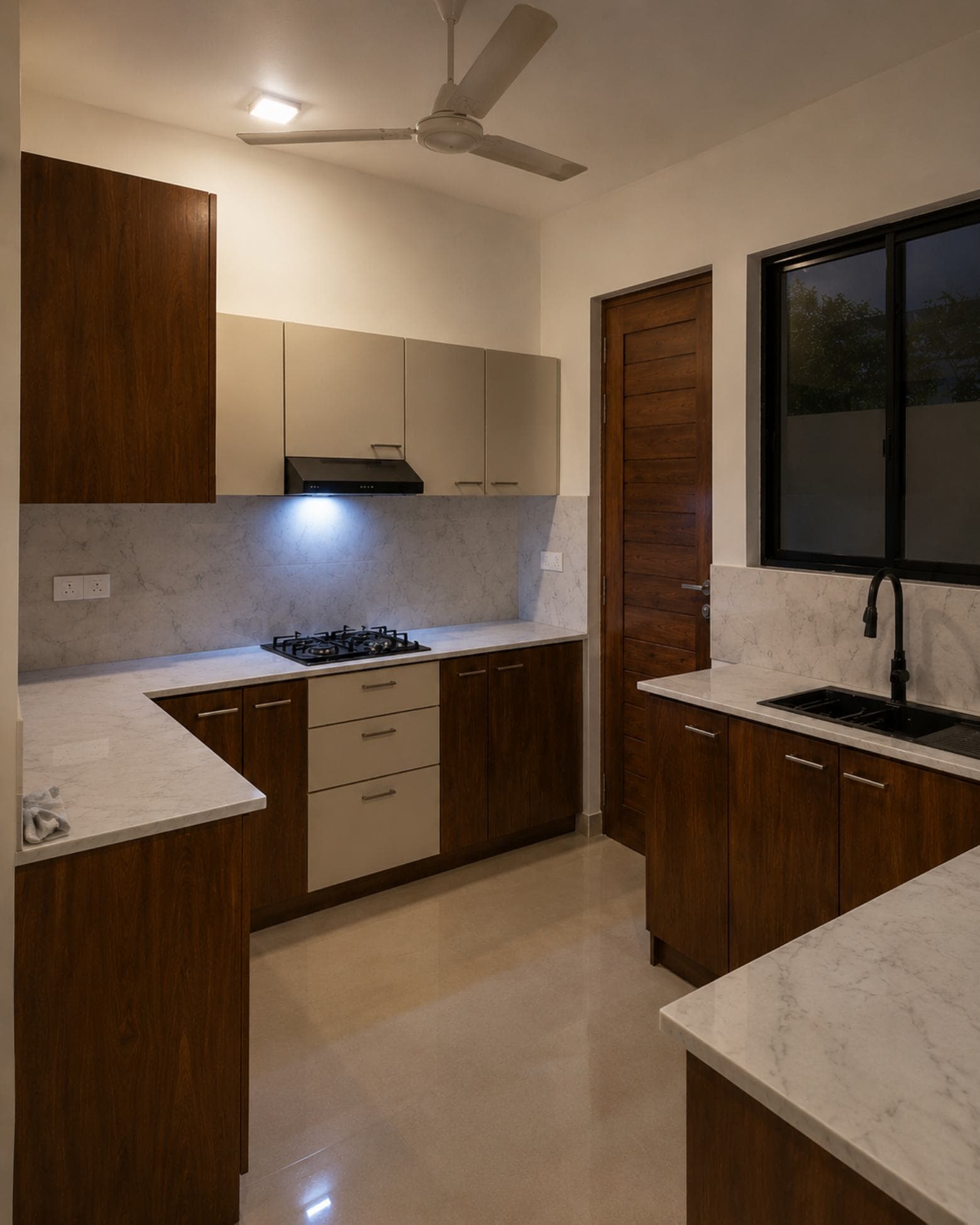 No. 11/11A, Saman Mawatha, Sirimal Uyana — kitchen with dual counters and marble splashback