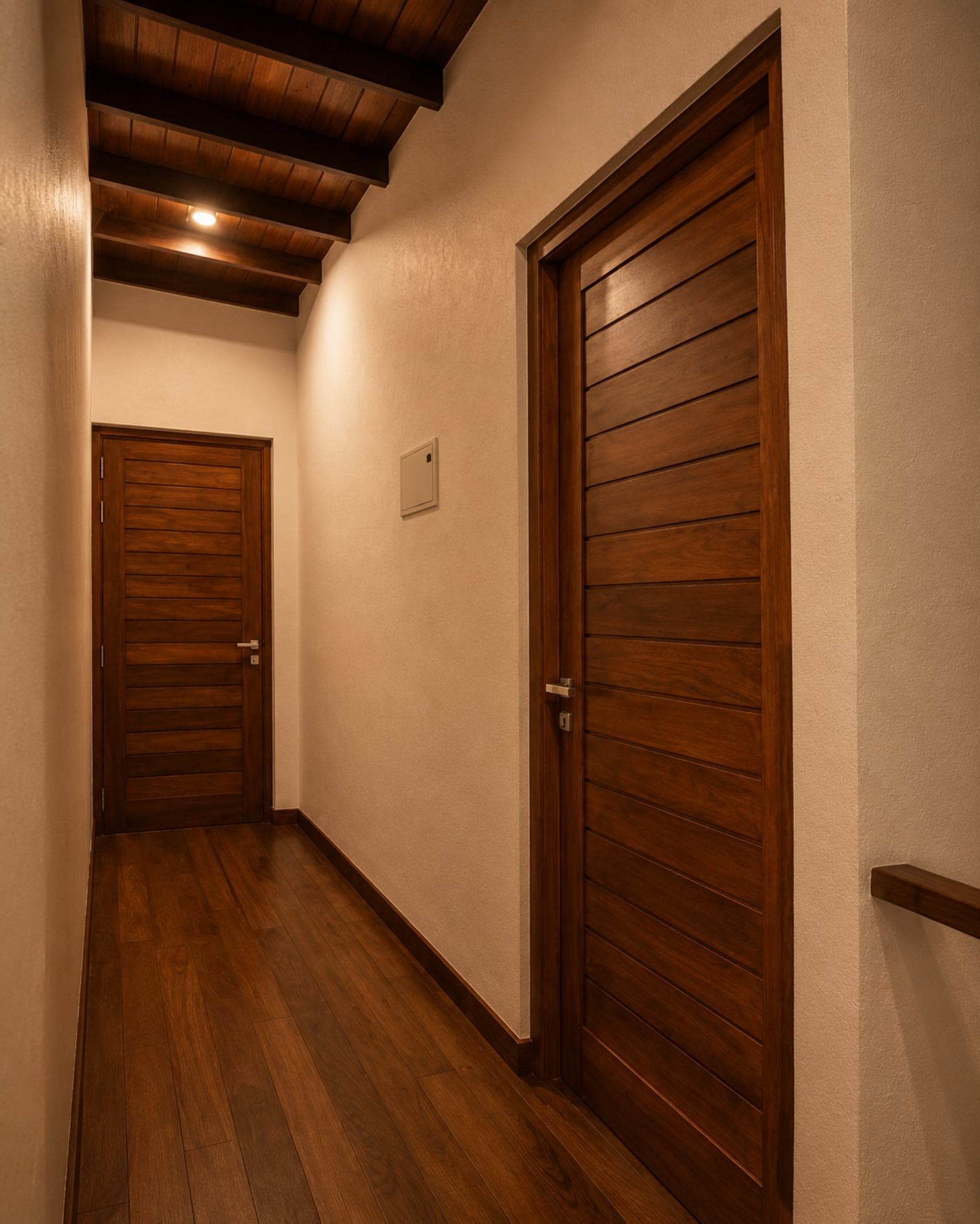No. 11/11A, Saman Mawatha, Sirimal Uyana — upper-floor hallway with vaulted timber-beamed ceiling