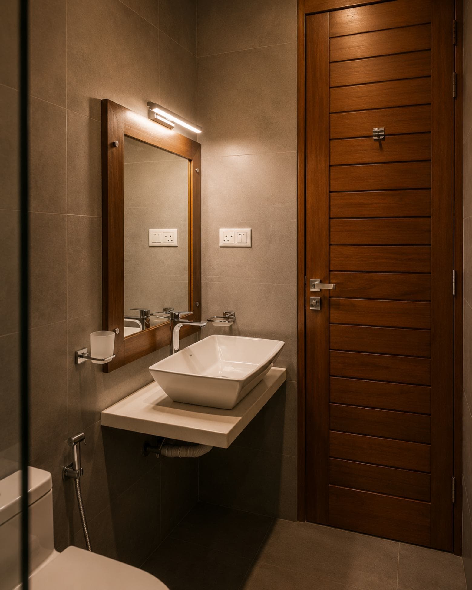 No. 11/11A, Saman Mawatha, Sirimal Uyana — bathroom vanity beside the timber panelled door