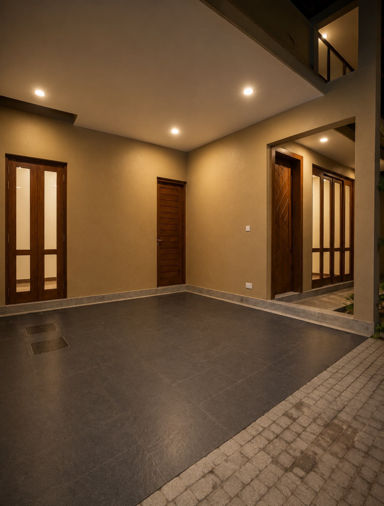 No. 11/11A, Saman Mawatha, Sirimal Uyana — covered parking court beneath the upper-floor overhang