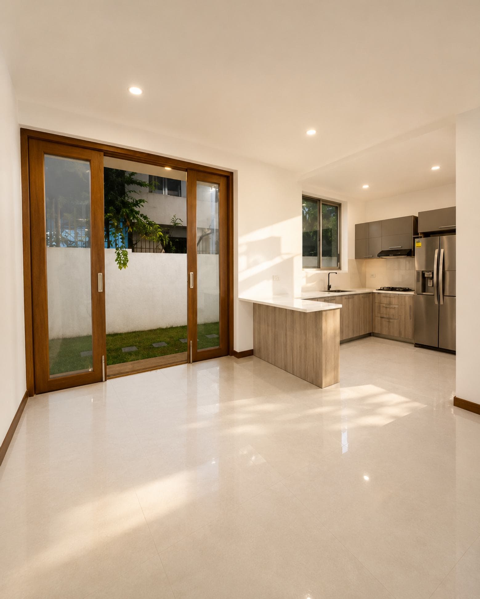 No. 45, Mallikarama Road, Ratmalana — living and dining with sliding timber doors onto the lawn