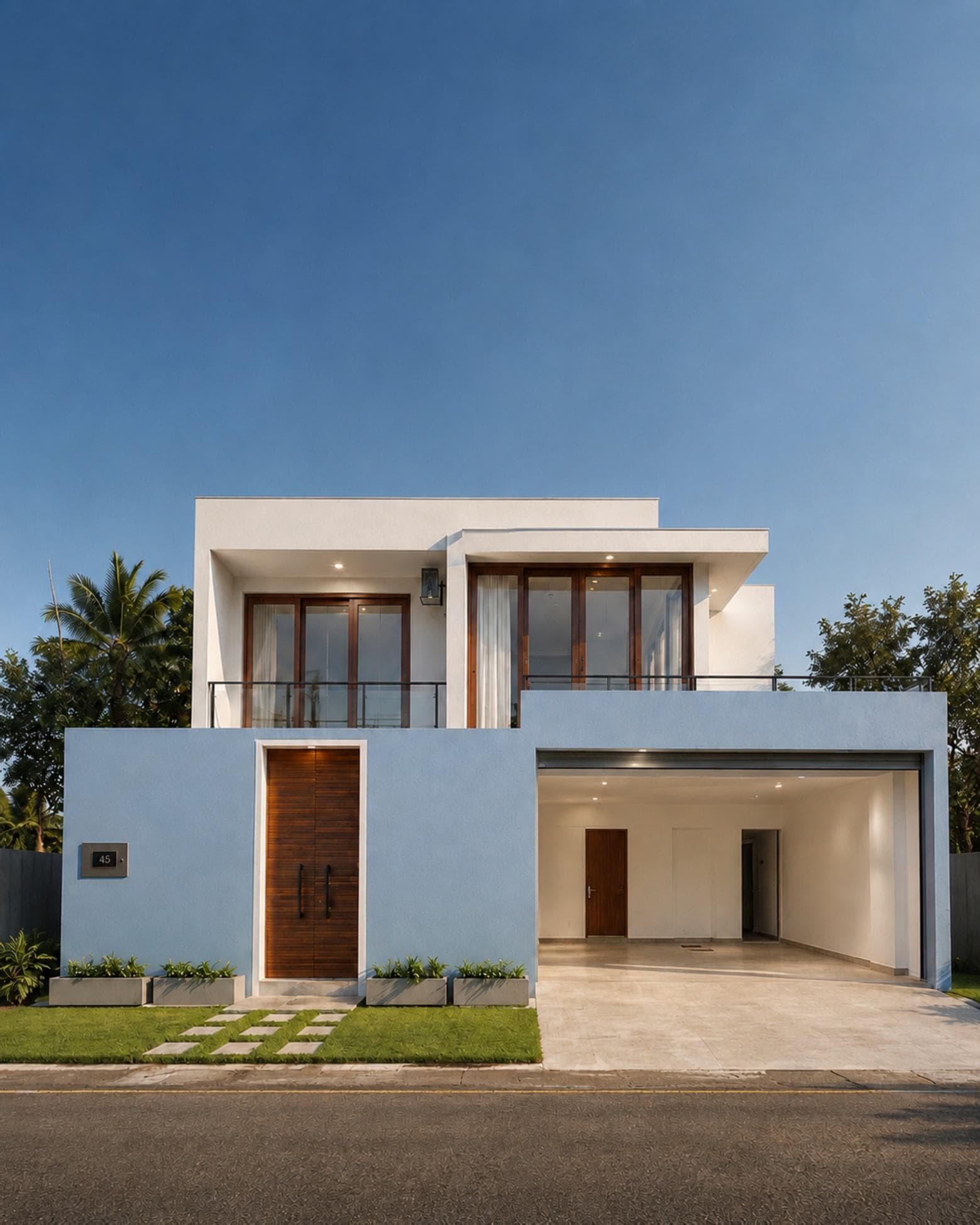 No. 45, Mallikarama Road, Ratmalana — street elevation at dusk, timber double doors beside an open carport