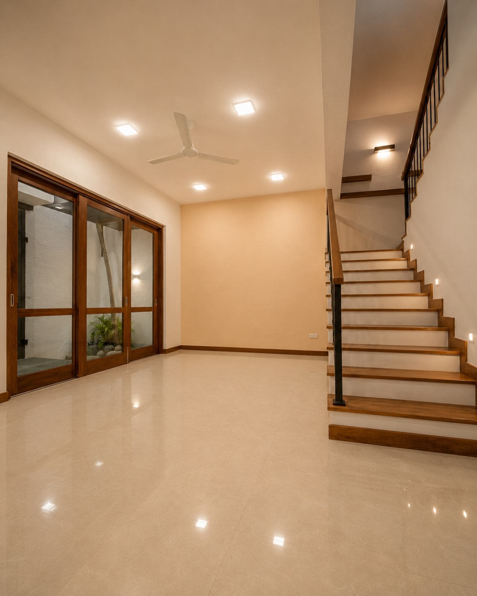 No. 47, Mallikarama Road, Ratmalana — reception room with sliding doors onto a planted light well