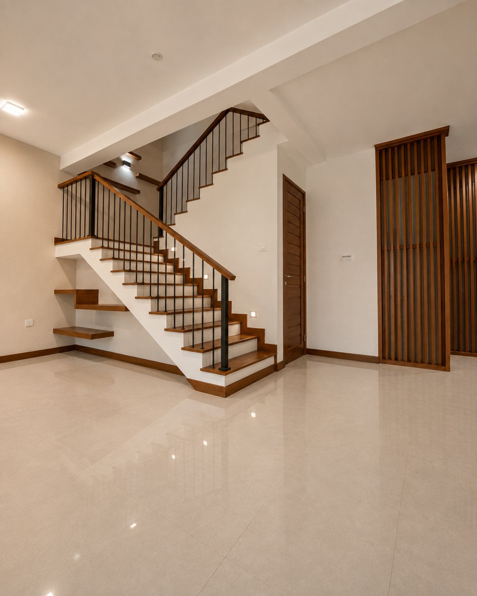 No. 47, Mallikarama Road, Ratmalana — stair hall with timber treads and slatted screen