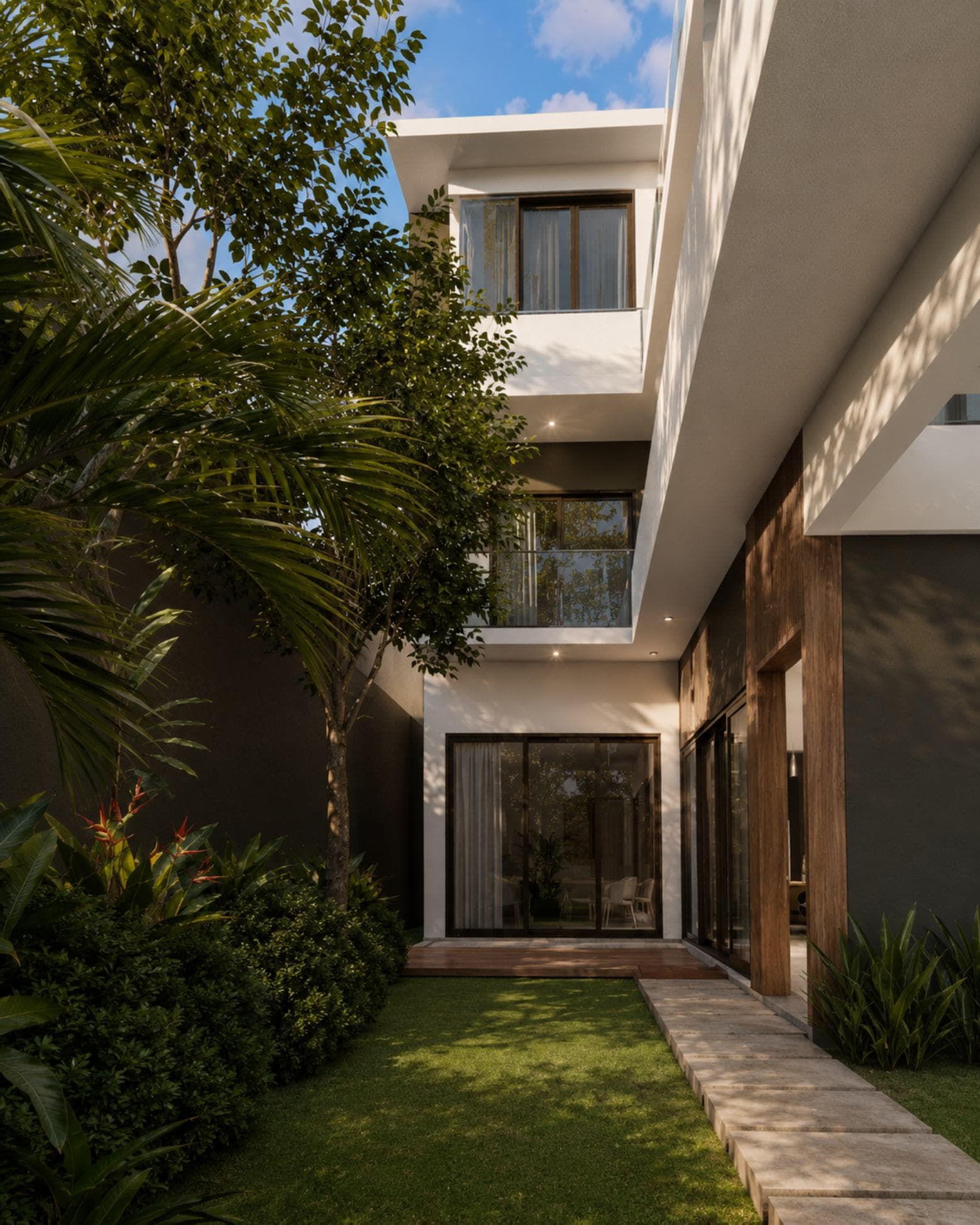 No. 48, Third Lane, Ratmalana — side courtyard garden looking back at the glazed living room