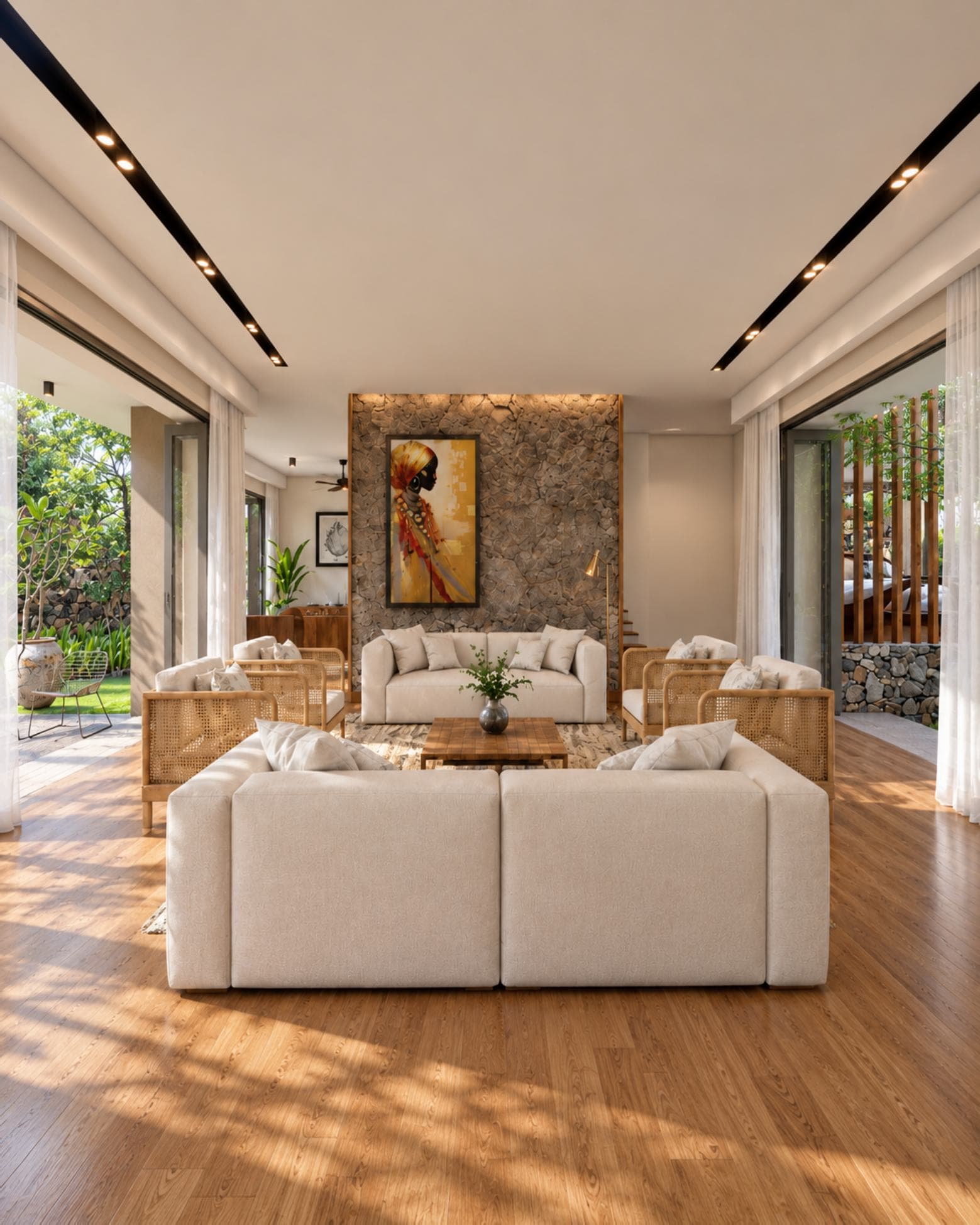 Templers Road 60/1, Mount Lavinia — living room with backlit rubble stone feature wall and rattan armchairs